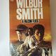 A Falcon Flies by Wilbur Smith — secondhand book