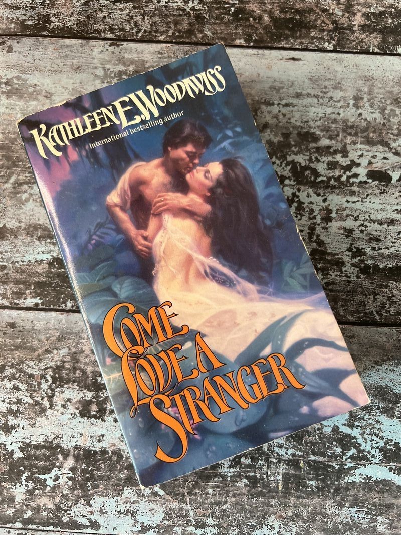 Come Love a Stranger by Kathleen E Woodiwiss