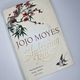 Sheltering Rain by Jojo Moyes — secondhand book