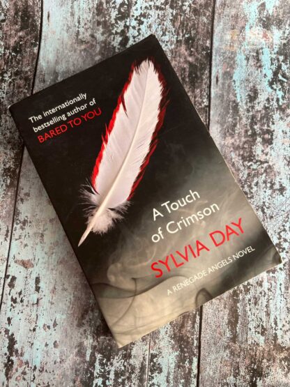 An image of a novel by Sylvia Day - A Touch of Crimson