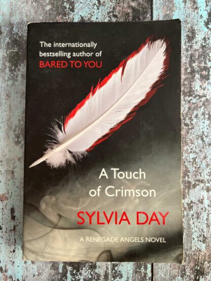 An image of a novel by Sylvia Day - A Touch of Crimson
