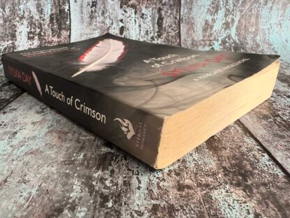An image of a novel by Sylvia Day - A Touch of Crimson