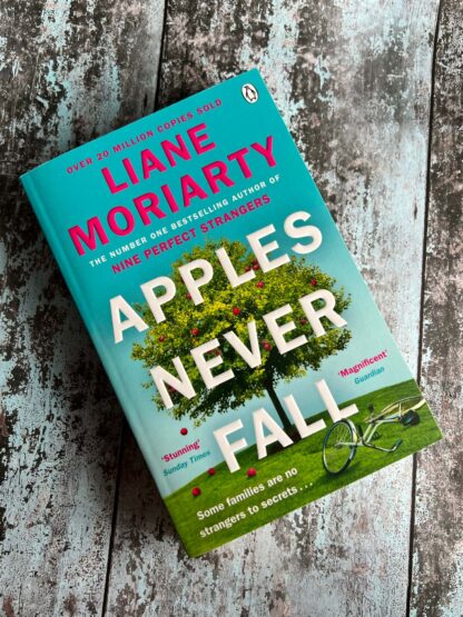 An image of a book by Liane Moriarty - Apples Never Fall