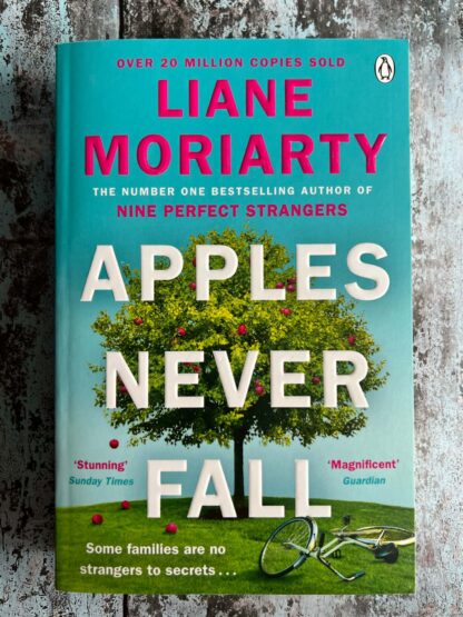 An image of a book by Liane Moriarty - Apples Never Fall