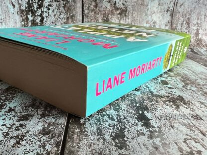 An image of a book by Liane Moriarty - Apples Never Fall