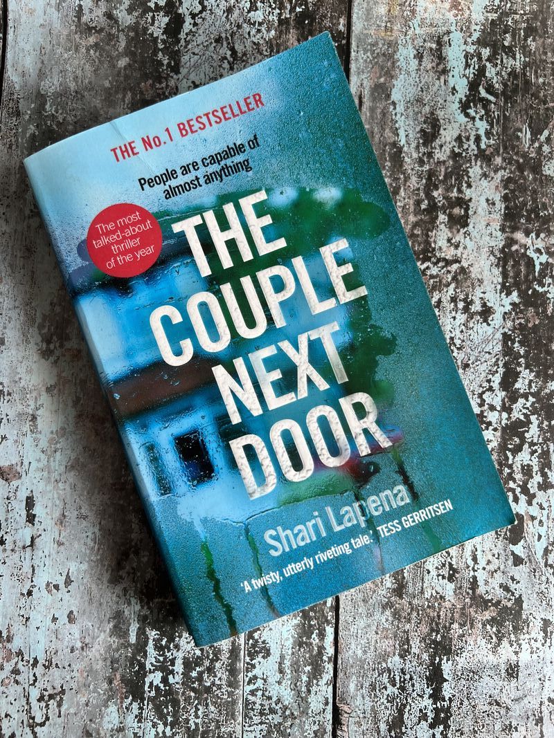The Couple Next Door StrangeBooks