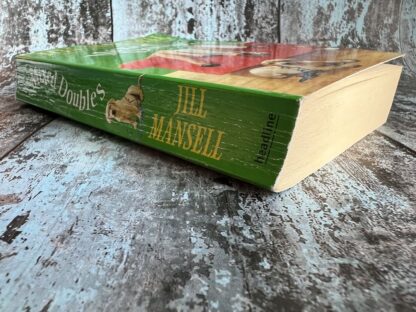 An image of a book by Jill Mansell - Mixed Doubles