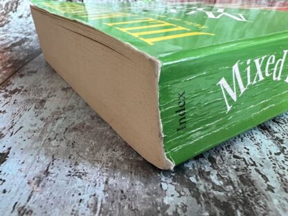 An image of a book by Jill Mansell - Mixed Doubles