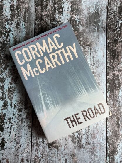 An image of a book by Cormac McCarthy - The Road