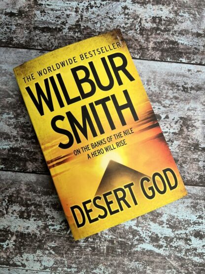 An image of a book by Wilbur Smith - Desert God