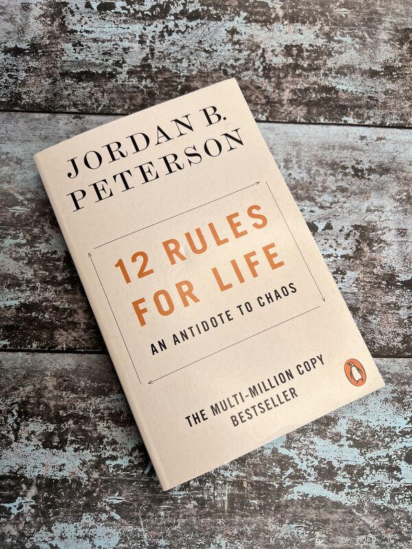 An image of a book by Jordan B Peterson - 12 Rules for Life