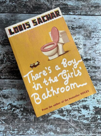 An image of a book by Louis Sachar - There's a boy in the girls bathroom