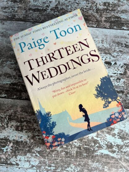 An image of a book by Paige Toon - Thirteen Weddings