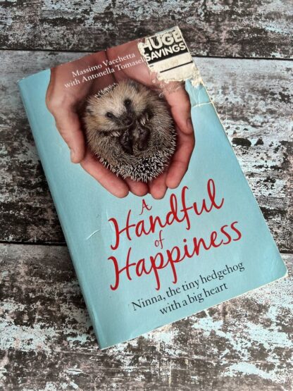 An image of a book by Massimo Vacchetta - A Handful of Happiness