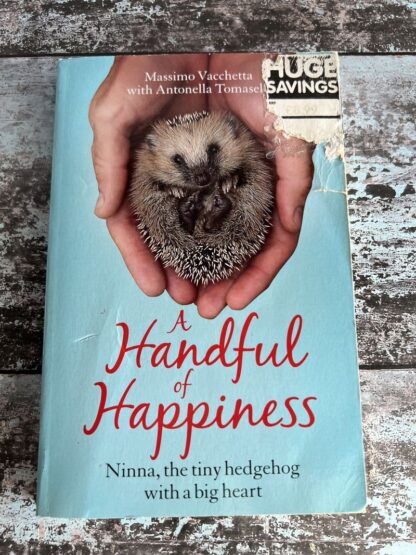 An image of a book by Massimo Vacchetta - A Handful of Happiness