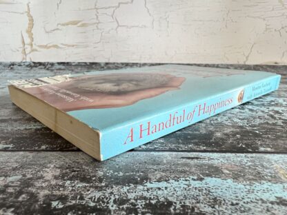 An image of a book by Massimo Vacchetta - A Handful of Happiness