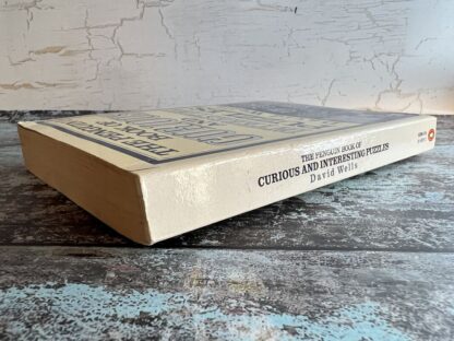 An image of a book by David Wells - The Penguin book of curious and interesting puzzles