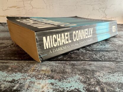 An image of a book by Michael Connelly - A Darkness More than Night