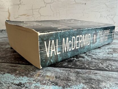 An image of a book by Val McDermid - The Grave Tattoo