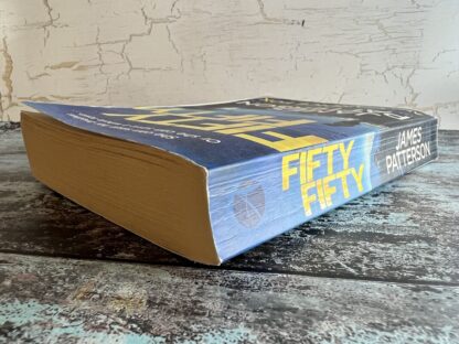 An image of a book by James Patterson and Candice Fox - Fifty Fifty