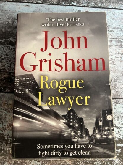 An image of a book by John Grisham - Rogue Lawyer