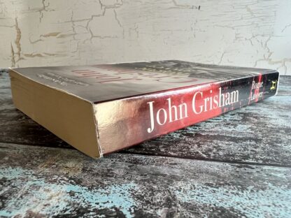 An image of a book by John Grisham - Rogue Lawyer