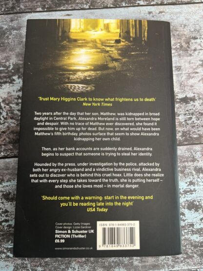 An image of a book by Mary Higgins Clark - I'll Walk Alone