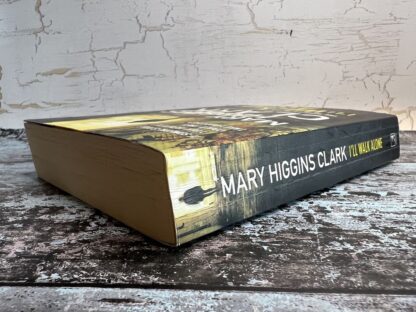 An image of a book by Mary Higgins Clark - I'll Walk Alone