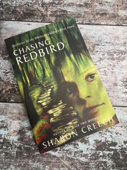 An image of a book by Sharon Creech - Chasing Redbird