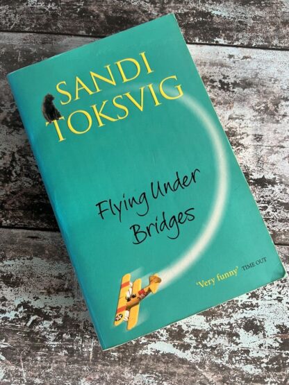 An image of a book by Sandi Toksvig - Flying Under Bridges