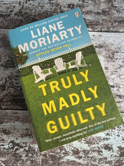 An image of a book by Liane Moriarty - Truly Madly Guilty