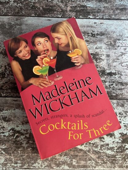 An image of a book by Madeleine Wickham - Cocktails for Three