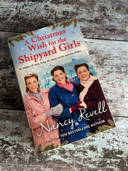 An image of a book by Nancy Revell - A Christmas Wish for the Shipyard Girls