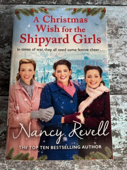 An image of a book by Nancy Revell - A Christmas Wish for the Shipyard Girls
