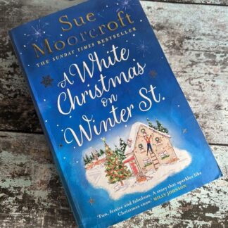 An image of a book by Sue Moorecroft - A white Christmas on Winter St