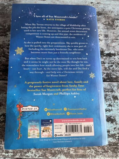 An image of a book by Sue Moorecroft - A white Christmas on Winter St