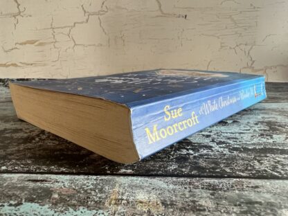 An image of a book by Sue Moorecroft - A white Christmas on Winter St