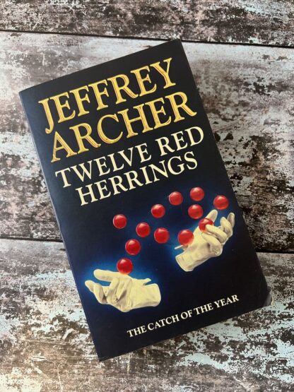 An image of a book by Jeffrey Archer - Twelve Red Herrings
