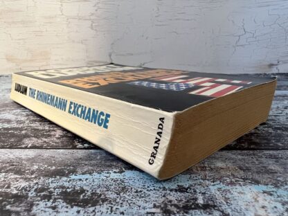 An image of a book by Robert Ludlum - The Rhinemann Exchange
