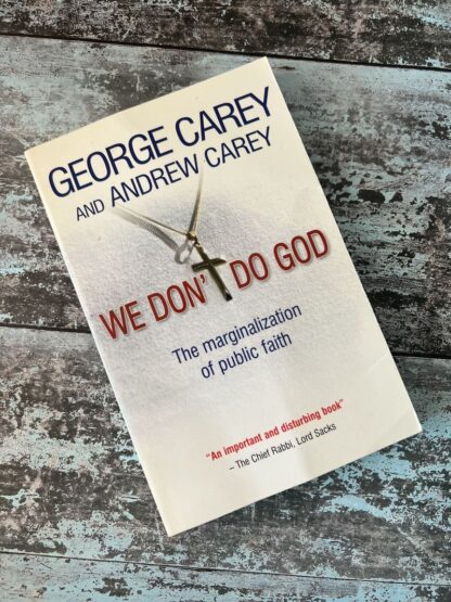 An image of a book by George Carey and Andrew Carey - We Don't do God