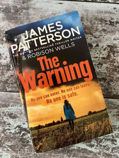 An image of a book by James Patterson - The Warning