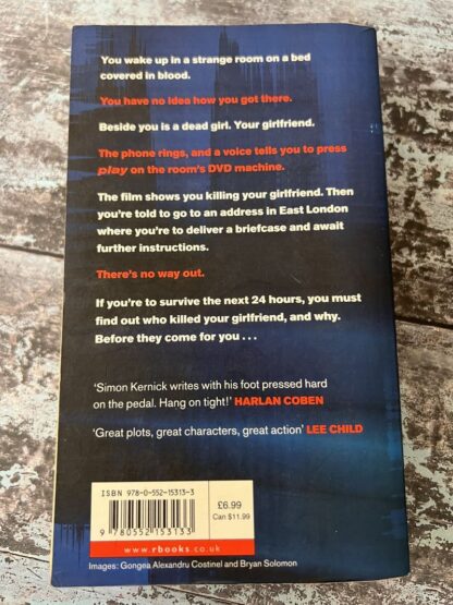 An image of a book by Simon Kernick - Severed