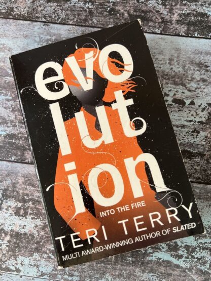 An image of a book by Teri Terry - Evolution into the Fire