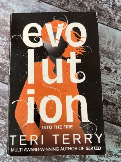 An image of a book by Teri Terry - Evolution into the Fire