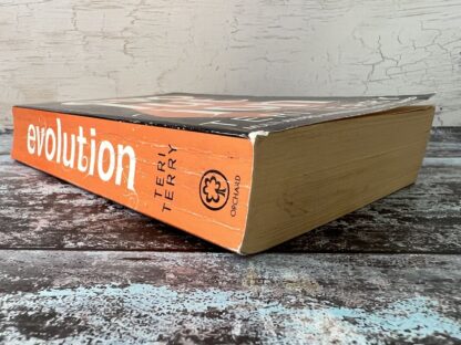 An image of a book by Teri Terry - Evolution into the Fire