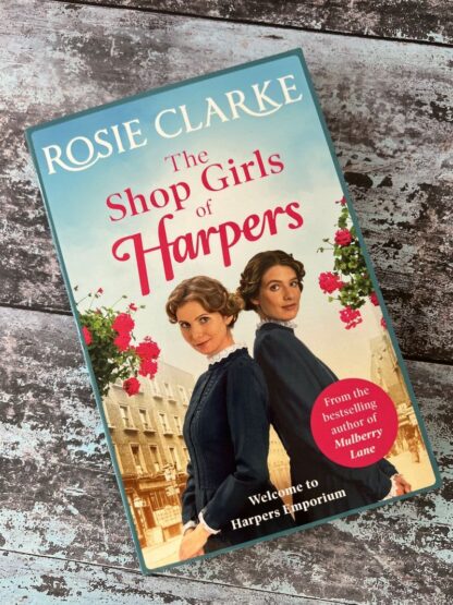 An image of a book by Rosie Clarke - The Shop Girls of Harpers