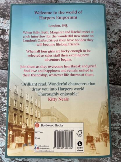 An image of a book by Rosie Clarke - The Shop Girls of Harpers