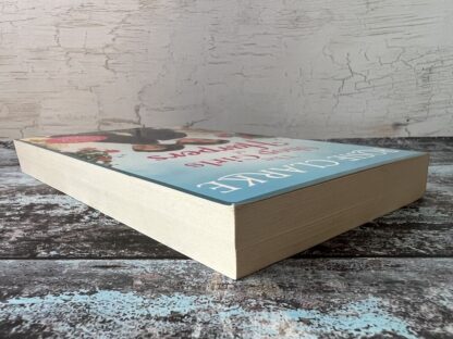 An image of a book by Rosie Clarke - The Shop Girls of Harpers
