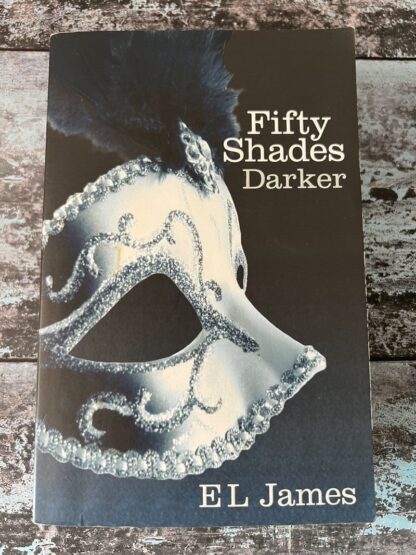 An image of a book by E L James - Fifty Shades Darker