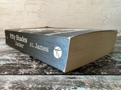 An image of a book by E L James - Fifty Shades Darker